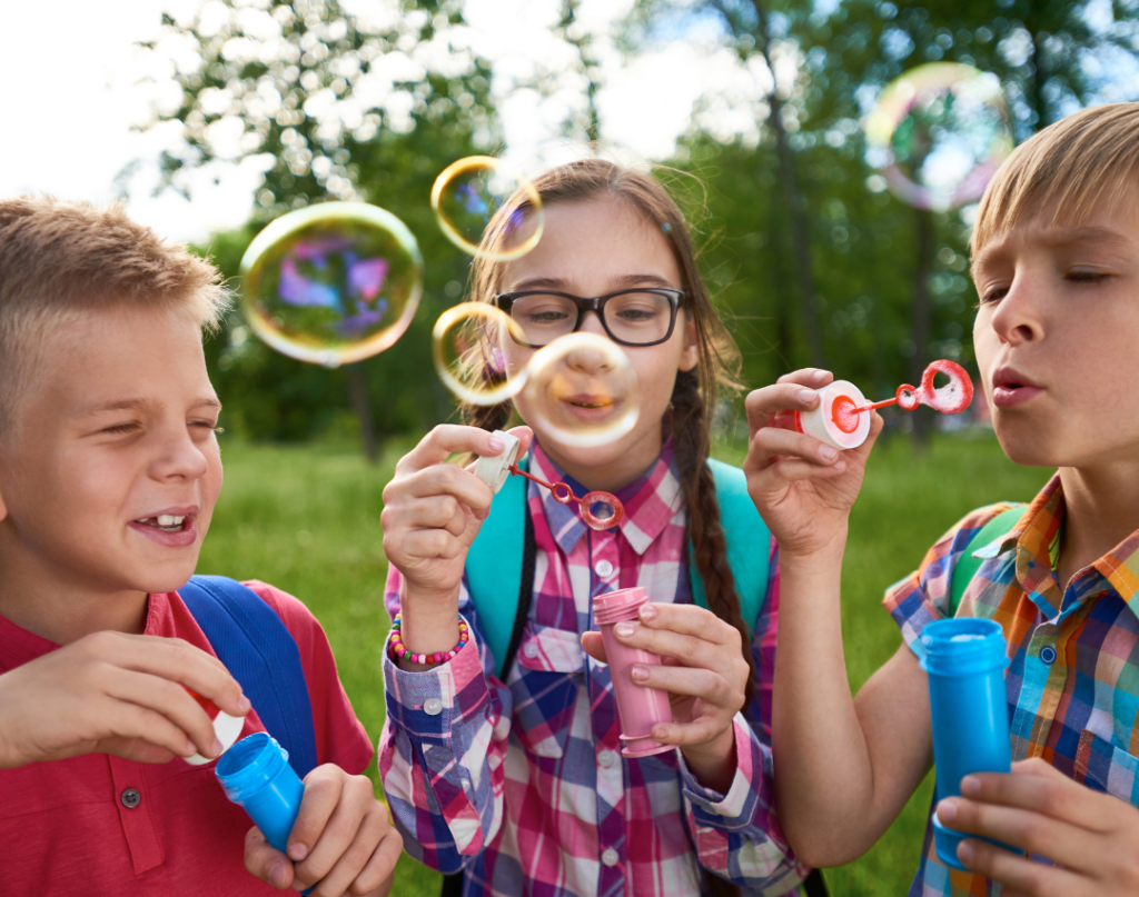 Kids blowing bubbles