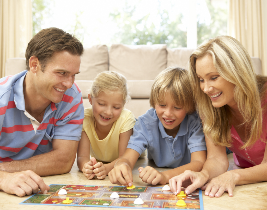 Family playing a board game