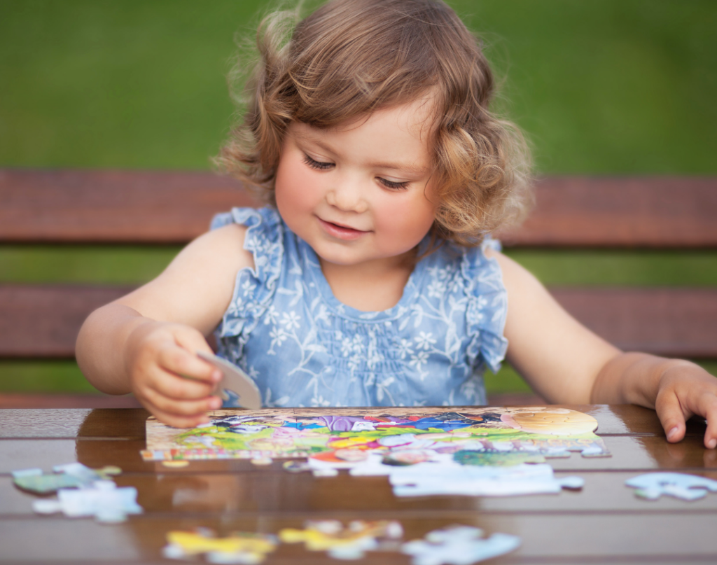 child doing a puzzle