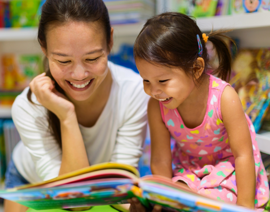 parent practicing early literacy with child