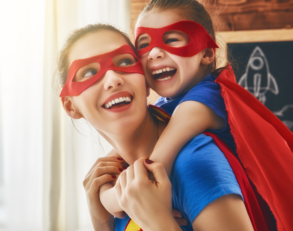 superhero imaginary play with child and mom