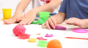 kids using playdough to help their pencil grasp
