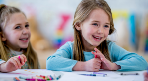 kids using small crayons to improve pencil grasp