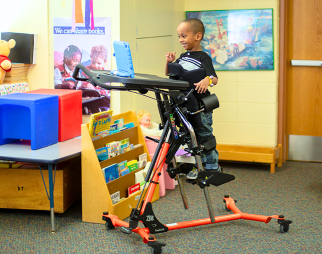 child using standing frame