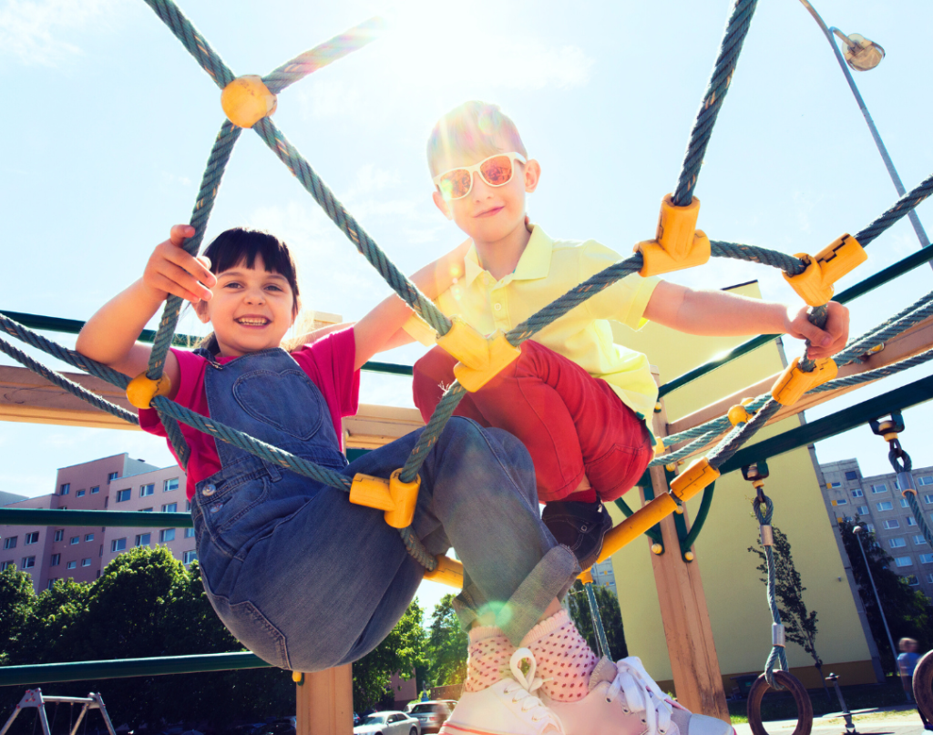 kids using proprioception on playground