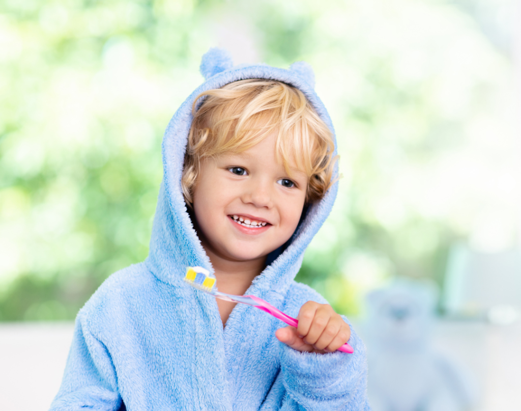 child brushing teeth