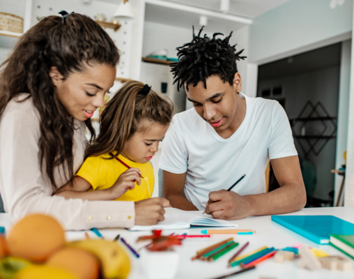 parents helping child with homework after school