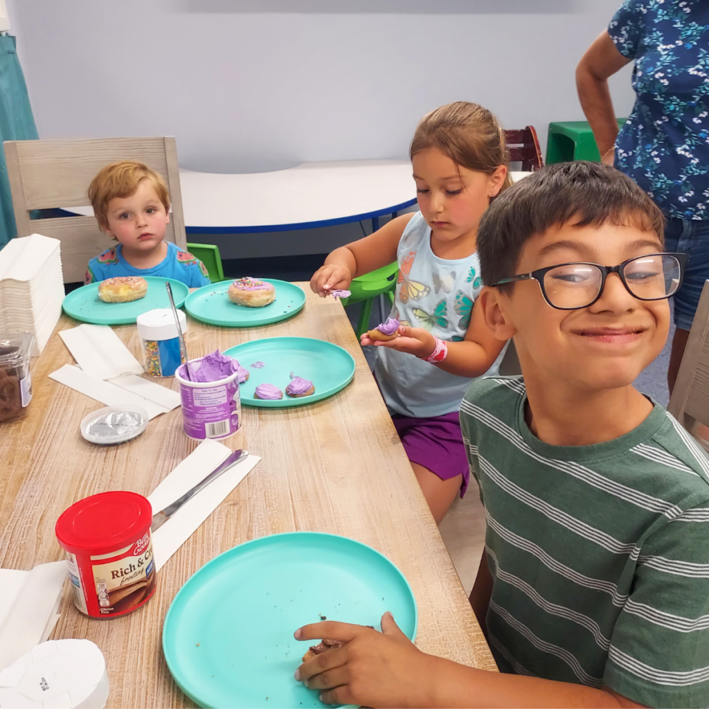 pediatric therapy clients enjoying treats